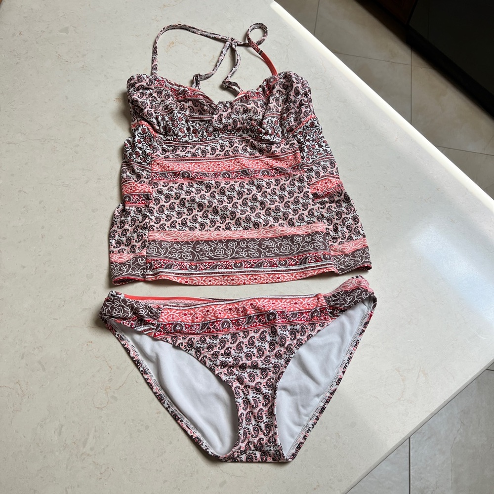 Like new tankini from Athleta with two different bottoms  Small bottoms med top